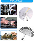 Feeler gauge set, 32 stainless steel blades, dual metric/SAE, shown in use on engine valves.