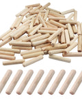 Kickass Fluted Wood Dowel Pins M8x40mm Hardwood Grooved Plugs Kiln Dried for furniture building, displayed in a scattered arrangement.