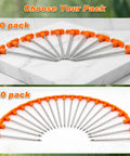 Heavy Duty 7 Inch Tent Stakes, 10 Pack Galvanized Steel Ground Anchors arranged in circle with orange heads for visibility.