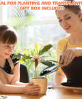 Woman and child using Heavy Duty Garden Shovel With Measurement Mark for planting in a pot.