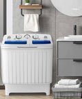 Chill Compact Twin Tub Washing Machine, 12 Lb Washer And 8 Lb Spinner Combo in a modern bathroom setting with dual timer dials.