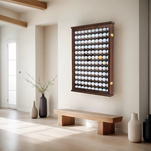 Roomy 120 Ball Golf Ball Display Case With UV Protection And Lockable Beech Wood Cabinet In Walnut Finish on modern wall