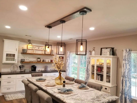Industrial Black Pendant Light Fixture With Geometric Wire Cage illuminating a modern kitchen island setting