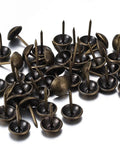 250 Piece Hand Forged Bronze Upholstery Tacks For Furniture And Sofas Featuring Round Head Antique Style Nails, close-up view.