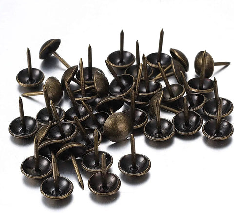 250 Piece Hand Forged Bronze Upholstery Tacks For Furniture And Sofas Featuring Round Head Antique Style Nails, close-up view.
