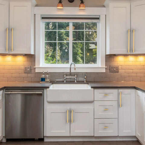 Champagne Bronze Cabinet Pulls 5 Inch Center To Center, 10 Pack Zinc Alloy Cabinet Handles installed on white kitchen cabinets.