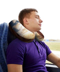 Man using Rock Climbing Inspired Travel Pillow For Neck Support Ergonomic U Shaped Memory Foam Pillow Portable Napping Cushion in vehicle