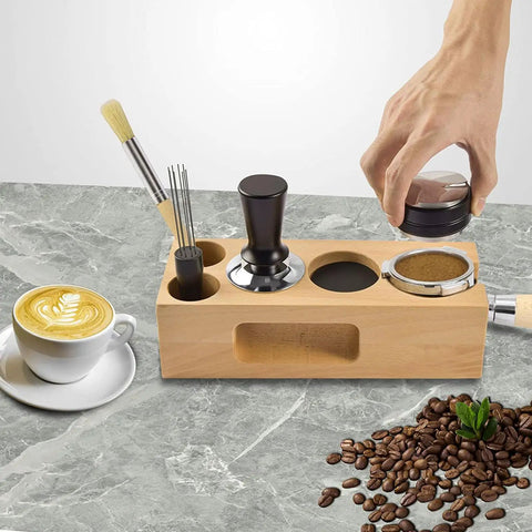 Top Tier Wood Coffee Tamper With Precision Powder Distributor Kit featuring wooden base, tools, and coffee cup.