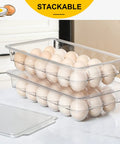 2 Pack Stackable 18 Egg Holder For Refrigerator With Lids, clear plastic bins stacked with eggs in kitchen