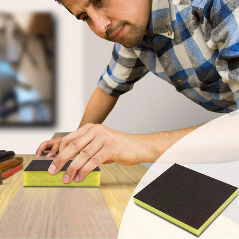 Person using Wet Dry Sandpaper Set With Sanding Sponge, 90-Piece Assorted Grit 400 to 3000, 9x3.6 Inch Sheets on wood surface.