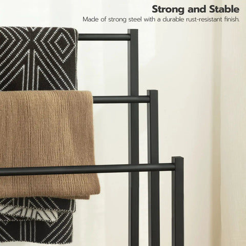 Close-up of Free Standing Towel Rack And 3 Tier Blanket Organizer Space Saver For Home No Clutter Industrial Metal Rack