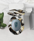 Marble Vein Round Resin Toilet Seat for Bathroom on a toilet, showing a floral design and adjustable hinges, 14.5" x 16.5".