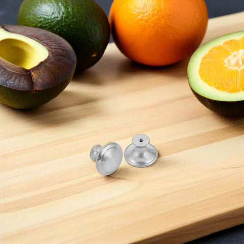 Replacement Screw Nut Caps For Beverage Dispenser Silver Plastic Caps Moisture Shield 2 Sets Tough As Nails Build Keeps Electronics Safe Easy Install Leakproof Hardware For Commercial And Home Use silver caps on wood board with fruit