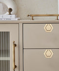 Two Pack Zinc Alloy Flush Mount Cabinet Pull Handles Gold Finish Flat Ring Style installed on beige cabinet
