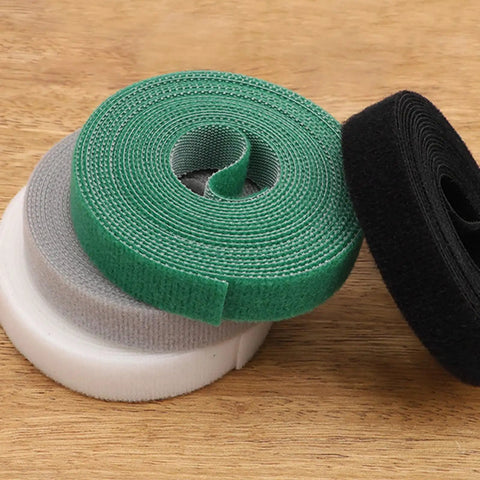 Heavy Duty Reusable Cable Management Straps White Tearable Cord Organizer Tie For Computer Speaker Guitar Wires in green, grey, and black.