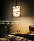 Bedroom with Sleek Modern Mini Pendant Light For Kitchen Island And Dining Room With 6.3 Inch Matte Black Spiral Cage And Handblown Frosted Glass Shade Adjustable Cord 1 Pack