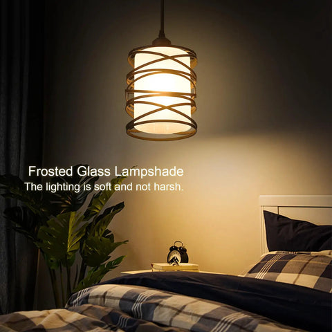 Bedroom with Sleek Modern Mini Pendant Light For Kitchen Island And Dining Room With 6.3 Inch Matte Black Spiral Cage And Handblown Frosted Glass Shade Adjustable Cord 1 Pack