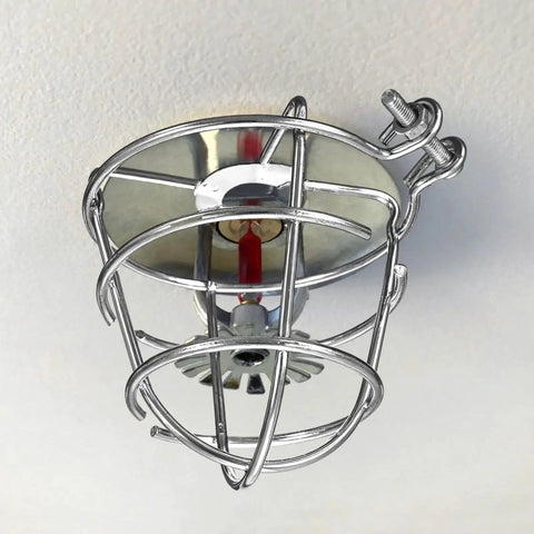 Heavy Duty Iron Fire Sprinkler Head Covers 4 Pack Dome Cage Protectors mounted on ceiling for impact resistance.