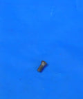 Top Shelf MS1153 Indexable Insert Retaining Screw For CNC Milling And Lathe Operations resting on blue background.