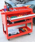 Heavy Haul Rolling Tool Cart With Silent Polyurethane Wheels And Rounded Corner Shelves For Your Ultimate Workshop Garage Flex And Red Parts Stacker Organizers holding tools on shelves with a car in the background.