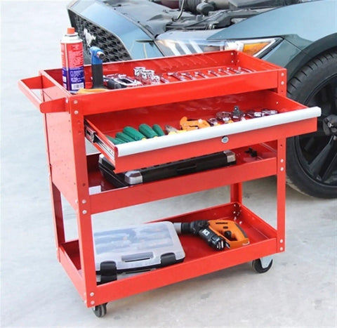 Heavy Haul Rolling Tool Cart With Silent Polyurethane Wheels And Rounded Corner Shelves For Your Ultimate Workshop Garage Flex And Red Parts Stacker Organizers holding tools on shelves with a car in the background.
