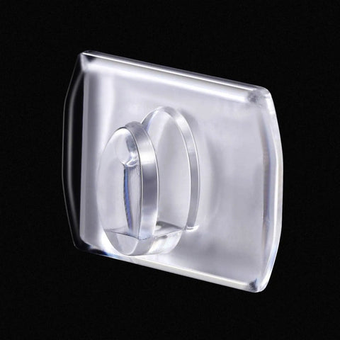 Close-up of Mini Clear Decorating Hook Clip with Adhesive Tape, ideal for damage-free hanging, transparent 0.71 by 0.51 inches.