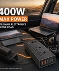 Heavy Duty 400W Car Power Inverter 12V DC To 110V AC For Tesla And EVs Straight Plug In Accessory Adaptor in vehicle with devices.