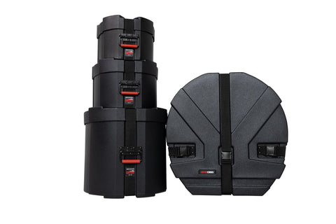 Four Piece Rock Style Drum Case Set Built Like A Tank With Durable Roto Molded Body And Heavy Duty Cinch Straps stacked gear cases.