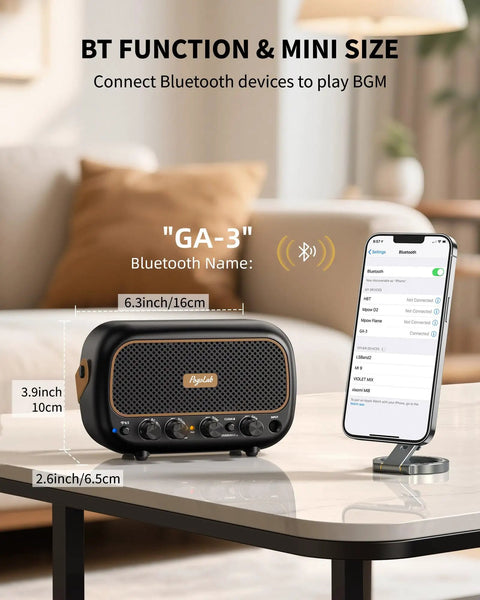 Compact 5W Per Channel Guitar Amp, Portable Battery Powered Practice Speaker With Bluetooth next to smartphone showing connection