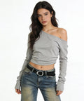 Reliable Daily Go To Womens Black Faux Leather Belt With Metallic Silver Buckle Adjustable Waist Strap For Denim Jeans And Flowy Dresses One Point Two Inch Width Dress Up Or Down Fits Like A Dream styled with gray off-shoulder top and jeans.