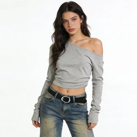 Reliable Daily Go To Womens Black Faux Leather Belt With Metallic Silver Buckle Adjustable Waist Strap For Denim Jeans And Flowy Dresses One Point Two Inch Width Dress Up Or Down Fits Like A Dream styled with gray off-shoulder top and jeans.