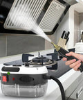 Heavy Duty Handheld Steam Cleaner With 2500W Pressurized High Temp Power blasting steam on a kitchen stovetop for cleaning.