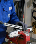Person using Chainsaw Sharpening Files Set CS SLS 4.0 In Roll Bag on a chainsaw, showing file in action.