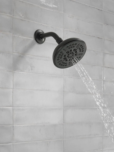 8 Spray Touch Clean Matte Black Shower Head With Full Body Spray Massage Shampoo Rinsing Pause Spray And Soft Full Spray Easy Clean Nozzles 2.5 GPM Water Flow Delivers A High Pressure Spa Like Shower Experience For Any Shower installed on gray tiled wall