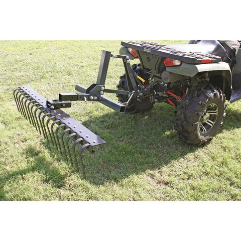 Landscape Rake Attachment For ATV Or UTV, 60 Inch Wide With 17 Tines, attached to ATV on grass field