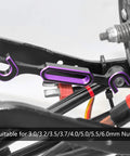 Close-up of Purple Aluminum RC Wrench from 4-Piece Set, attached to RC car, for 3.0-6.0mm nuts.