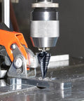 Double Spiral Cobalt Step Drill Bit M35 With Hex Shank Unibit For Metal And Stainless Steel One Quarter To One And One Eighth Inch TiAIN Coated Heavy Duty Cutter drilling metal.
