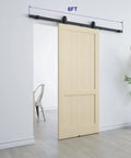 6 Ft Sliding Barn Door Hardware Kit With Top Mounted Track For Aluminum Glass Doors installed showing wood panel, matte black finish