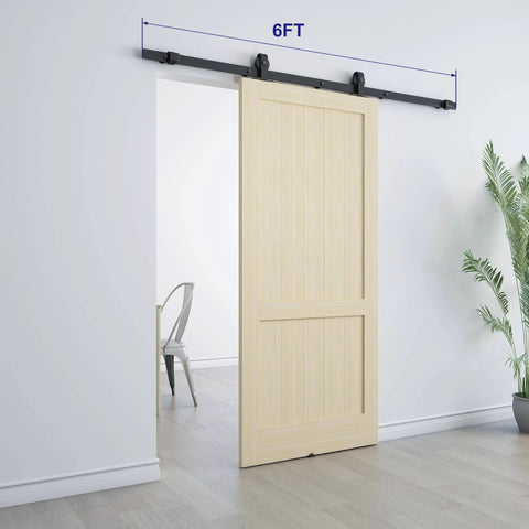 6 Ft Sliding Barn Door Hardware Kit With Top Mounted Track For Aluminum Glass Doors installed showing wood panel, matte black finish