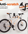 Rock Solid Heavy Duty Garage Wall Mount Hooks 8 Pack With Complete Screw And Expansion Anchor Kit holding a bike on a wall, featuring anti-scratch rubber sleeve.