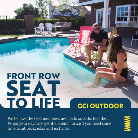 Sweet Tea Comfort Pro Rocker Outdoor Rocking Chair With Shoulder Strap by a poolside, two adults in swimsuits relaxing.