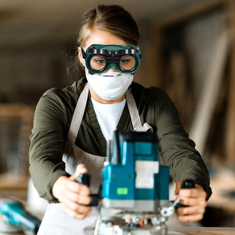 Woman using Two Pack Kickass Welding Safety Goggles With Quick Flip Cover And Slip Resistant Adjustable Headband.