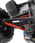 Close-up of hard steel CVD drive shafts for 1/16 TRX E-Revo Summit RC, showing front axle and tire details.