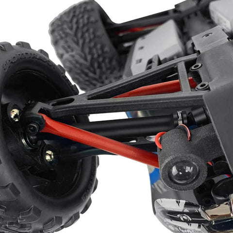 Close-up of hard steel CVD drive shafts for 1/16 TRX E-Revo Summit RC, showing front axle and tire details.