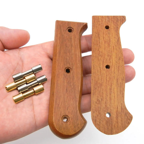 Hand holding wooden knife handles with brass and stainless steel fasteners from Sixteen Sets Brass And Stainless Steel Bracket Bolt Fasteners For Knife Making Include Screws And Studs Knife Handle Pins Rivets And Tactical Lock Hardware 6 mm Head Diameter The Go To DIY Knifemaking Kit