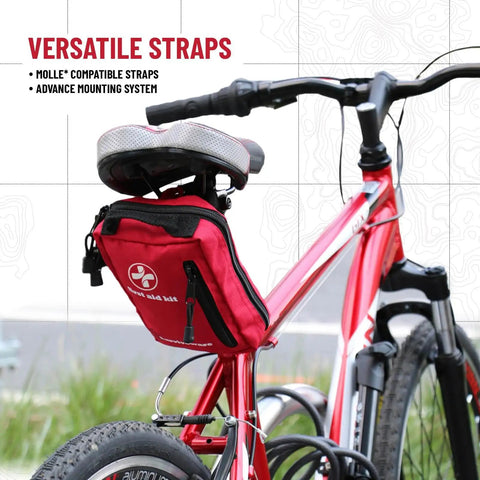 Red bicycle with 98 Piece Premium First Aid Kit For Travel, Camping, Home And Outdoor Emergencies With Labeled Compartments attached under seat.
