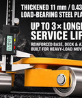 Close-up of heavy-duty machine skates for moving industrial equipment with thickened steel plate and smooth casters.