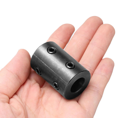 Black oxide steel shaft coupling with 1/2 in bore, 1 in OD, 1-1/2 in length; four set screws