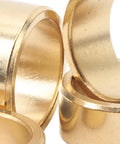 Close-up of Pro Grade Blade Arbor Adapter Set For Concrete Cutoff Saws, 5 Pack, Metal Reducer Rings, showing metallic finish