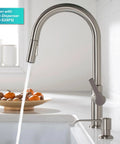 Game Changer Stainless Steel Pull Down Kitchen Faucet With Spot Free Brushed Finish and Full Range Swivel Spout, water flowing into sink.